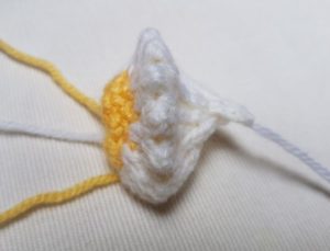 Handmade Knitted Primrose Flower Piece Side View Fitting in Knitting Children Quick Craft Ideas