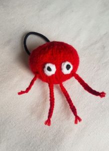 https://fittinginknitting.co.uk/wp-content/uploads/2019/03/Handmade-Knitted-Red-Nose-with-Legs-Fitting-in-Knitting-Children-Craft-Ideas-218x300.jpg