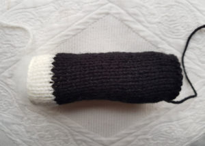 handmade knitted swan sewn swan neck fitting in knitting